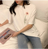 Camisa estampada con bolsillo de flores